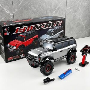 Alternative view of Professional 1/10 scale 4WD off-road climbing vehicle designed for rugged terrain and rock crawling. Equipped with a functional electric winch mounted to the front bumper for authentic recovery scenarios.