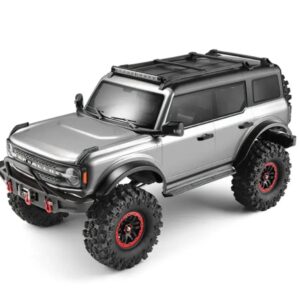 Professional 1/10 scale 4WD off-road climbing vehicle designed for rugged terrain and rock crawling. Equipped with a functional electric winch mounted to the front bumper for authentic recovery scenarios.